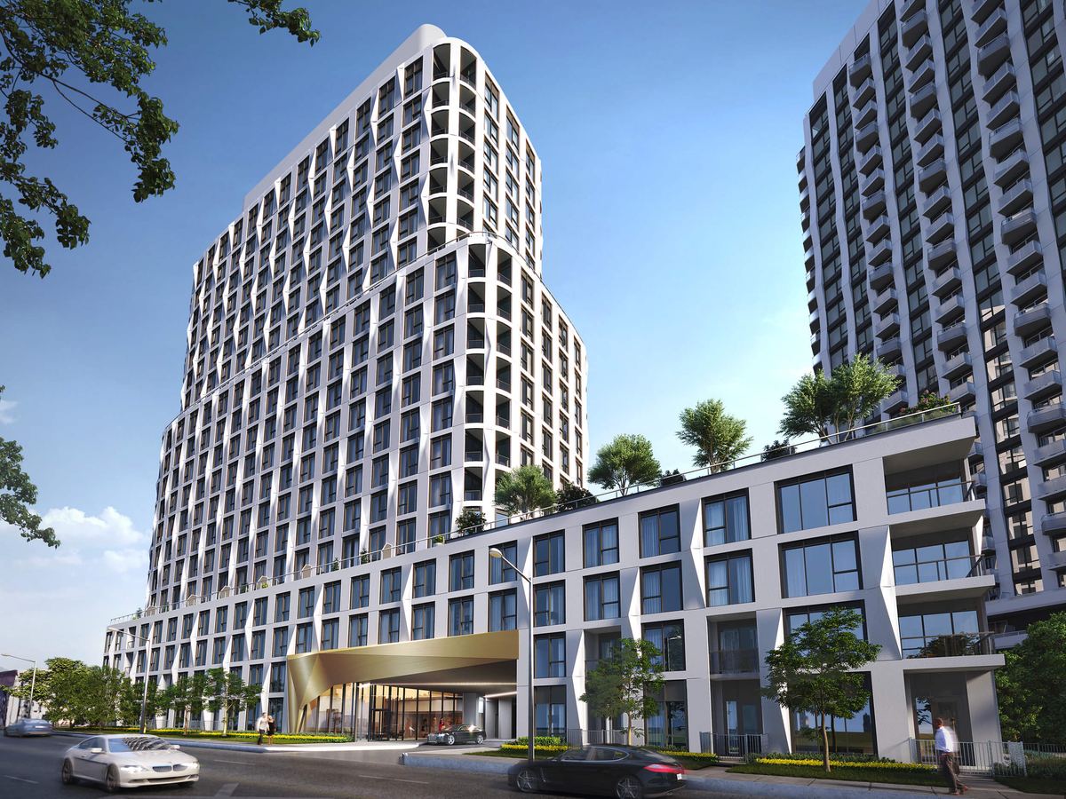 Modern condo building exterior with landscaped entrance